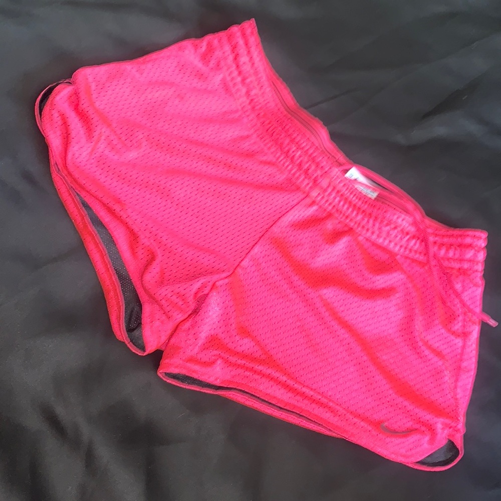 Pink Nike women small dry-fit shorts .
